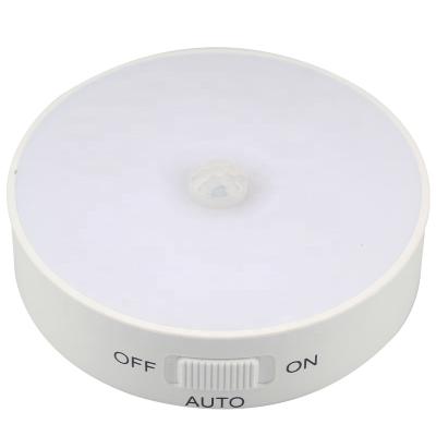 China New post-modern factory round LED induction light DIY battery lighting bedroom wardrobe smart night light for sale