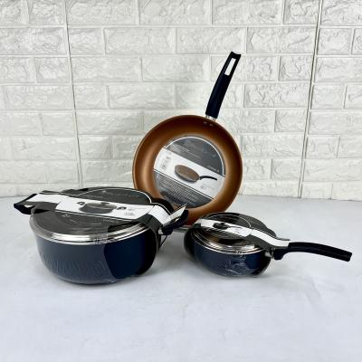 China Sprial Sustainable Aluminum Bottom 5pcs Non Stick Pots And Pans Non Stick Liner Cookware Sets for sale