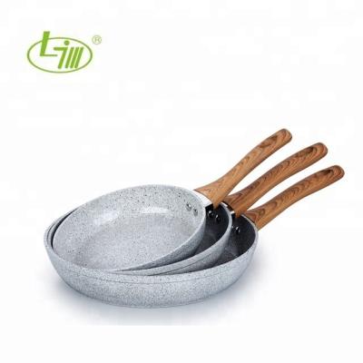 China 20-24-28 Sustainable Granite Pan Set of 3 PCs with Wooden Handle and Induction Heat Resistant Bottom for sale