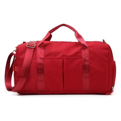 China Multiple Color Nylon Travel Bag With Handle Dry And Wet Separation for sale