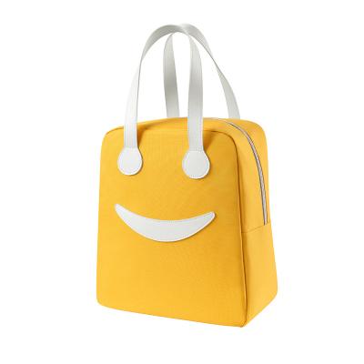 China Waterproof Wholesale Lunch Bag Recyclable Insulated Smile Lunch Bag Cooler Bags For Women And Kids for sale