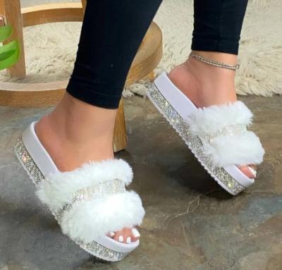 China Cheap Women Summer Home Slippers Breathable Faux Stone Fur Home Slides Jelly Diamond Bling Platform Beach Women Sandals Slippers for sale