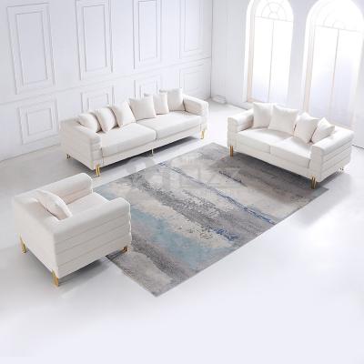 China Modern Designer Fabric Sofa Legs Living Room Furniture Gold Sofa Set Luxury Living Room for sale