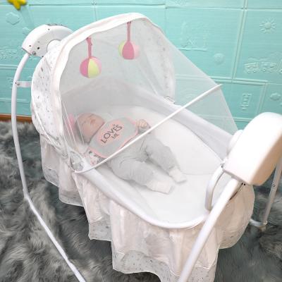 China Modern Indoor Remote Control Automatic Electric Swing Hanging Baby Crib Newborn Cradle For Infant for sale