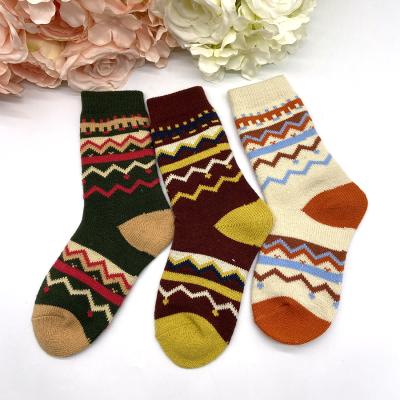 China ODM Custom Made High Quality Anti-skid Winter Socks Women Jacquard Warm Striped Socks for sale