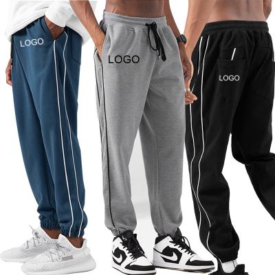 China Anti-Wrinkle Mens Pants Cotton Blend High Waist Outdoor Sports Tracksuit With Side Stripes Jogger Custom Casual Jogger Pants For Men for sale