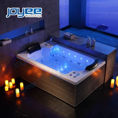 China Computer Control JOYEE Relax Acrylic 2 Person Sided Skirted Indoor Luxury Waterfall Massage Jetted Whirlpool Bathtub Luxury Led Bathtub for sale