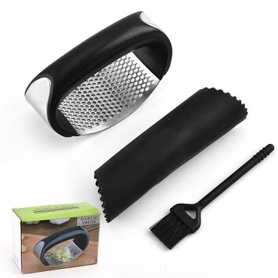 China New Viable Kitchen Tool 3 in 1 Set Silicone Manual Garlic Press Stainless Steel Plastic Garlic Peeler Brush for sale