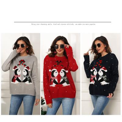 China Small Christmas Penguin Border Style Anti-wrinkle Jacquard Sweater Women Hot Christmas Long Sleeve Loose Sweater for sale