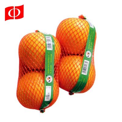 China Packing Net Bag Extruded Small Tubular Mesh Net Small Fruit Packaging Bags In Roll for sale