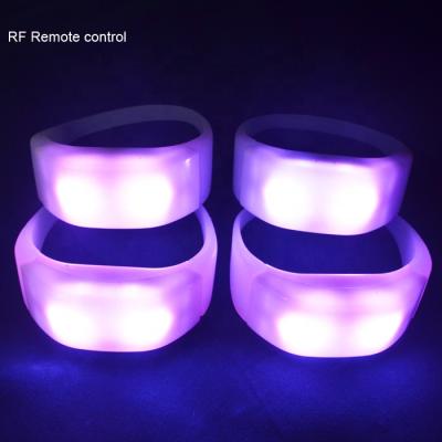 China ABS+PVC Plastic 500 Meters Led Remote Controller Xyloband RF Wristband for Coldplay for sale