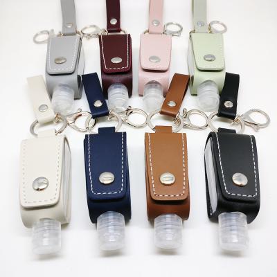 China Sport Fashion Leather Bottle Maker Liquid Hand Sanitizer Key Chain Lady Accessory Leather Keychain for sale