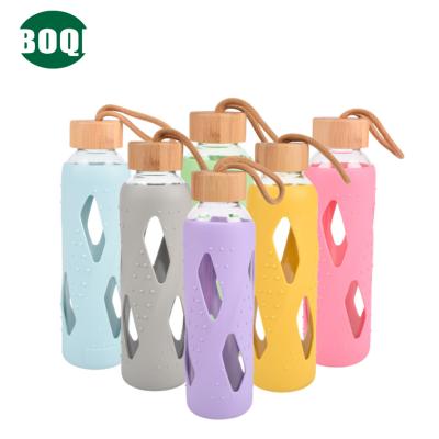 China Wholesale Sustainable Travel 500ml Manufacturer Outdoor Silicone Sleeve Straight BOQI Glass Bottle With Bamboo Lid for sale