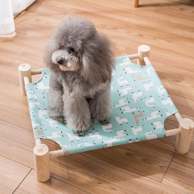 China Hand Wash Pet Nest Raised Portable Raised Dog Hammock Breathable Wooden Base Cat Bed Removable Cooling Canvas for sale