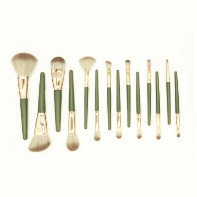 China Daily Makeup Tools 2021 Hot Sale 14pcs Professional Ultra Soft Green Makeup Brush Brush Handle Belt Strap Rolling Wooden Case for sale