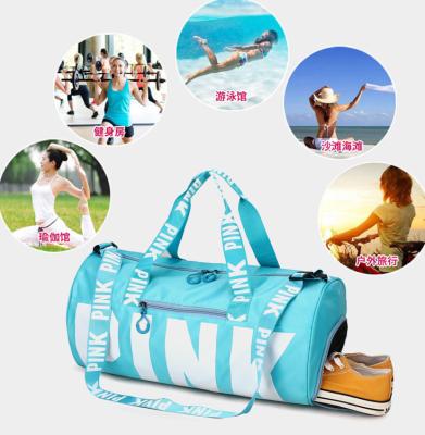 China Customized pink gym women daily life logo large capacity duffel bags waterproof sports travel bag for sale