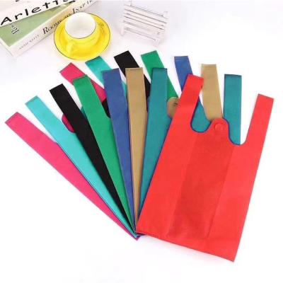 China 2021 Folding Well Selling Cheap Colorful Eco - Friendly Non Woven T Shirt Bag In Supermarket for sale