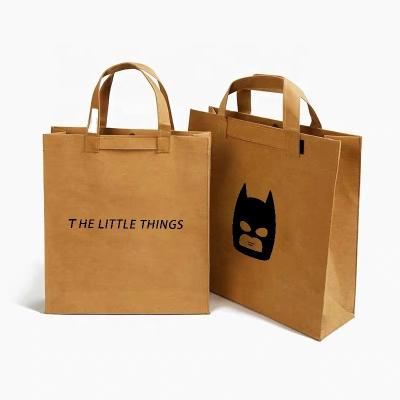 China Fashion 2021 Hot Sales New Design Eco Friendly Washable Kraft Paper Tote Bag for sale