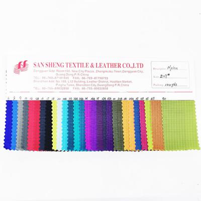 China 100%nylon 210D three-ply waterproof invisble lattice waterproof PU coated fabric for sale