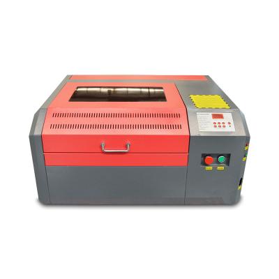 China Water-cooled Co2 Laser Engraving Cutting Machine For Nonmetal 4040 Working Area for sale