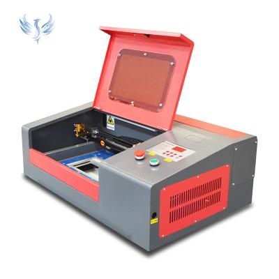 China Water-cooled SP-3020 40W 50W CO2 laser engraving machine laser cutting machine engraver cutter with factory price for sale