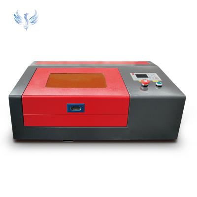 China Water-cooled High Speed 50w Co2 3020 Laser Cutting Engraving Machine For Sale for sale