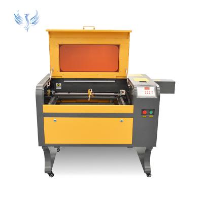 China Water-cooled China Factory Price Co2 Laser Engraving Machine 6040 Model For Printing Wood for sale