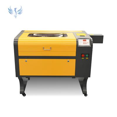 China Water-cooled Big Discount Co2 Laser Engraving Machine 6040 Model 80w For Wood for sale