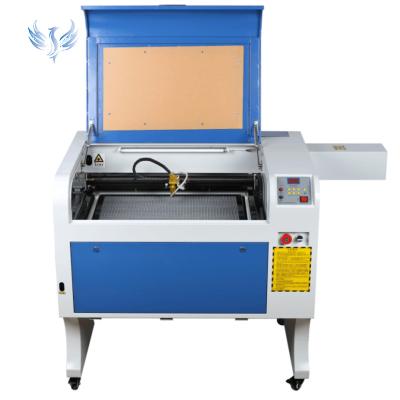 China Water-cooled Laser Cutting Machine Co2 Laser Engraving Machine 6040 Logo Acrylic Leather Rubber Wood 100W Laser Engraver price for sale