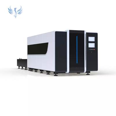 China Water-cooled 1kw 1.5kw 2kw 3kw 4kw 6kw high quality full cover 1530 fiber laser cutting machine with exchangeable table for sale