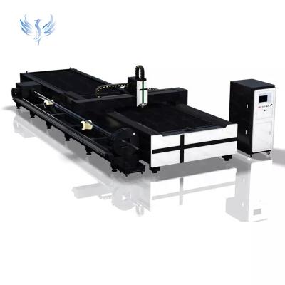 China Water-cooled Economic Steel tube and sheet cutter 1530 fiber laser cutting machine 6m tube with exchangeable table free online support for sale