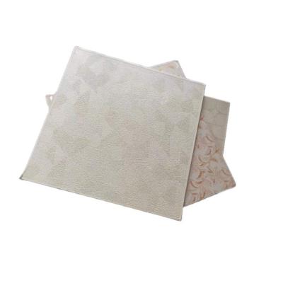 China Artistic Ceilings High Density China Gypsum PVC Ceiling Tiles 595*595*7 mm for sale