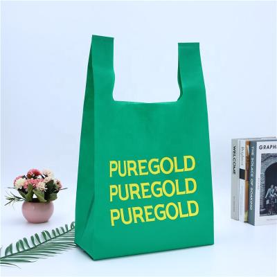 China Azo Free Nonwoven Grocery Tote Bags Vest Bag Eco Carry Out Bags Retail Supermarket With Handle for sale