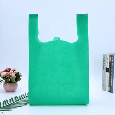 China AZO Free Colorful Supermarket Nonwoven Wholesale Mall Shopping Vest Bag Vest Empty Packaging Bag Nonwoven Carry Bags Fabric Nonwoven for sale