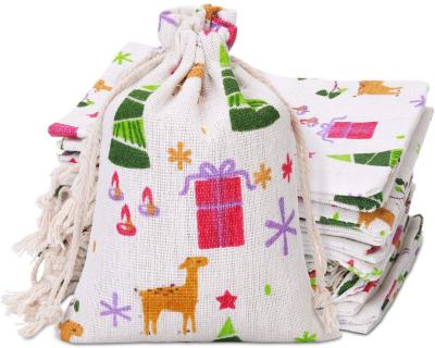 China AZO Free Printed Canvas Pouch Latest Christmas Holiday Party Supplies Reusable Drawstring Candy Treat Bags Christmas Gift Sack Burlap for sale