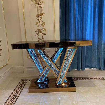 China Fashion modern furniture new design gold color crushed diamond mirrored console table with multi color LED light for sale