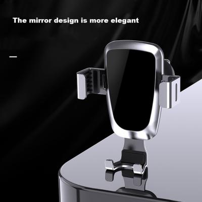 China Adjustable Glass Mirror Aluminum Alloy Gravity Duct Mobile Phone Holder Car Mount for sale