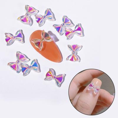 China Easy Apply Nail Art Bow 3D Small Nail Art Decoration Bulk Glitter Bow Color AB Crystal Rhinestone DIY Nail Accessories for sale