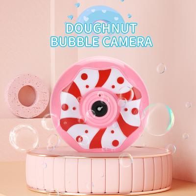 China New Design Plastic Cute Donuts Bubble Maker Machine Kids Electric Musical Soap Bubble Toy For Wholesale for sale