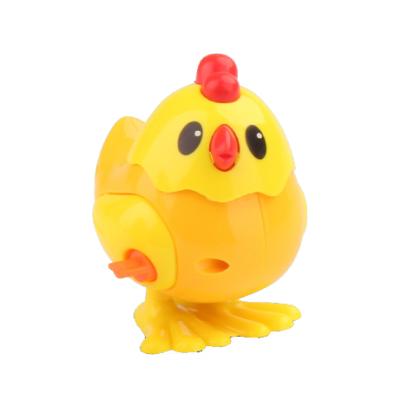 China Jumping Cute Design Small Cheap Promotional Gifts 12pcs Jumping Kids Plastic Wind Up Animal Toys for sale