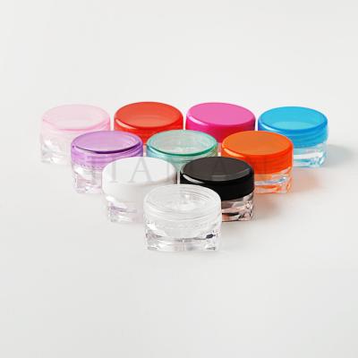 China 3g Small Jar, Plastic Box Mini Cosmetic Container Clear Cream Jar Skin Care Cream With Black Lids for sale