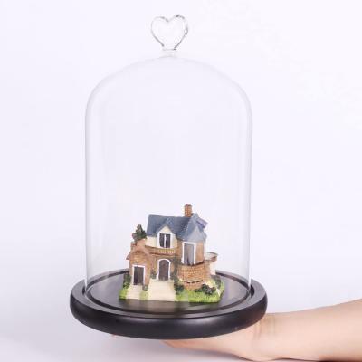 China Lead Free Clear Glass Dome Display Case Heart Handle Cloche with Black Wood Base for sale