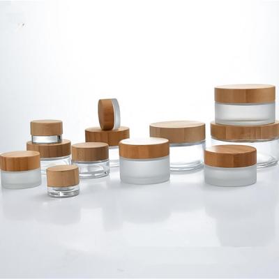 China Lead Free Refillable Eco Friendly Bamboo Cosmetic Facial Cream Container Baby Packaging 50g 100g Glass Jar for sale