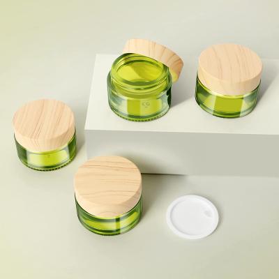 China Lead Free Attractive Cosmetic Bottle 30g Olive Color Face Cream Container Bamboo Cosmetic Packaging Jar for sale