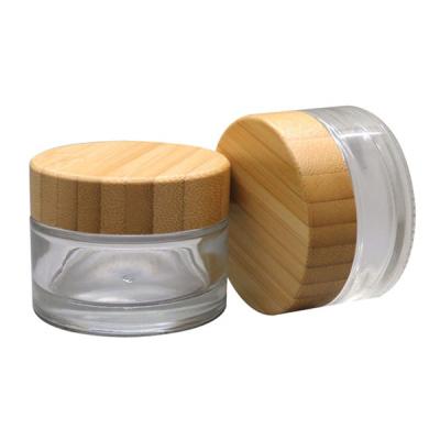 China Wholesale 30g 50g Eco Friendly Clear Glass Cosmetic Containers And Packaging Cosmetic Containers Jar With Bamboo Lid for sale