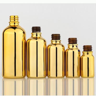 China Lead Free Luxury Essential Oil Bottles Custom Alumite Plating Electroplate Serum Glass Gold Dropper Bottle for sale