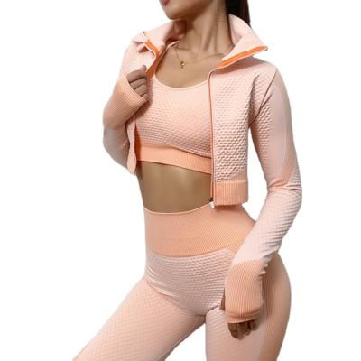 China Breathable Zipper Women Fitness Yoga Wear Seamless Sports Jacket Long Sleeve Yoga Tops for sale