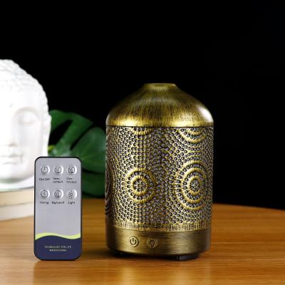 China Hotel Gift Remote Control Home Mist Humidifier 100ml Metal Aroma Essential Oil Diffuser With 7 Colors Led Change for sale