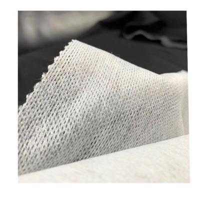 China Iron On Wholesale High Grade Single Dustproof Spunlace Fusible Mesh Nonwoven Interlining for sale