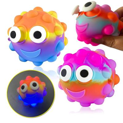 China Educational Funny Toy Pop Up Big Eyes 3d Stress Ball Stirring Toy Silicone Round Smile Face Push Bubble Stirring Person Jumping Ball for sale